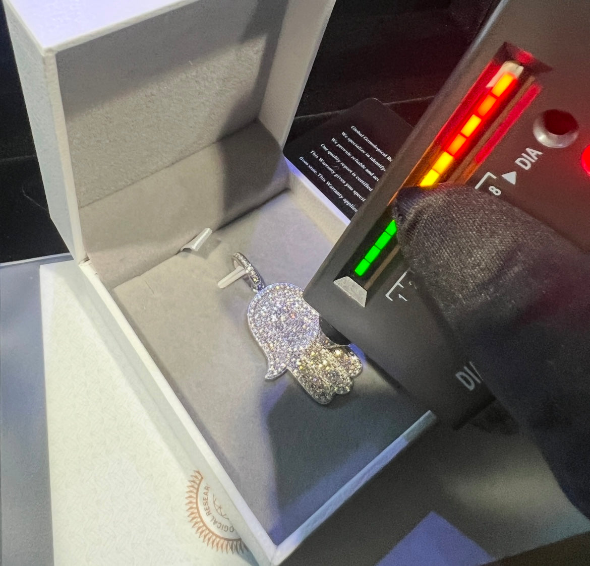 Hamsa hand pendant passes diamond tester